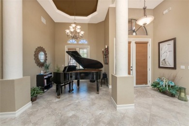 Stunning WATERFRONT custom pool home located in desirable deed on Saint Andrews South Golf Club in Florida - for sale on GolfHomes.com, golf home, golf lot