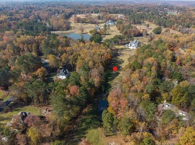 Discover this former golf fairway - now stunning 4.2-acre on Trophy Club of Atlanta in Georgia - for sale on GolfHomes.com, golf home, golf lot