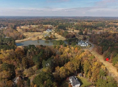 Discover this former golf fairway - now stunning 4.2-acre on Trophy Club of Atlanta in Georgia - for sale on GolfHomes.com, golf home, golf lot