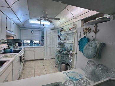 This spacious unit is located in Rotonda West- just minutes to on Rotonda Golf and Country Club The Hills Course in Florida - for sale on GolfHomes.com, golf home, golf lot