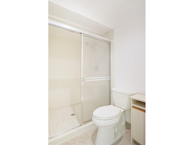 Brand-new roofs coming soon - no assessment! Enjoy stunning lake on Miles Grant Country Club in Florida - for sale on GolfHomes.com, golf home, golf lot