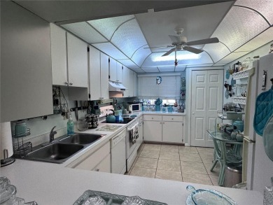 This spacious unit is located in Rotonda West- just minutes to on Rotonda Golf and Country Club The Hills Course in Florida - for sale on GolfHomes.com, golf home, golf lot