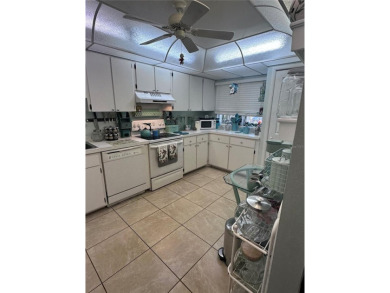 This spacious unit is located in Rotonda West- just minutes to on Rotonda Golf and Country Club The Hills Course in Florida - for sale on GolfHomes.com, golf home, golf lot