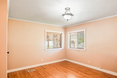 This well-maintained 4-bedroom, 2-bath double wide offers on Bill Roberts Municipal Golf Course in Montana - for sale on GolfHomes.com, golf home, golf lot