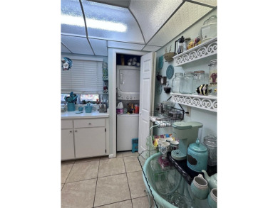 This spacious unit is located in Rotonda West- just minutes to on Rotonda Golf and Country Club The Hills Course in Florida - for sale on GolfHomes.com, golf home, golf lot