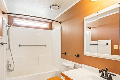 This well-maintained 4-bedroom, 2-bath double wide offers on Bill Roberts Municipal Golf Course in Montana - for sale on GolfHomes.com, golf home, golf lot