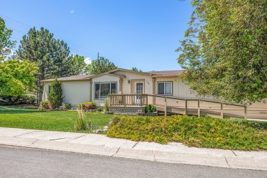 This well-maintained 4-bedroom, 2-bath double wide offers on Bill Roberts Municipal Golf Course in Montana - for sale on GolfHomes.com, golf home, golf lot