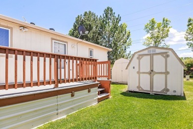 This well-maintained 4-bedroom, 2-bath double wide offers on Bill Roberts Municipal Golf Course in Montana - for sale on GolfHomes.com, golf home, golf lot