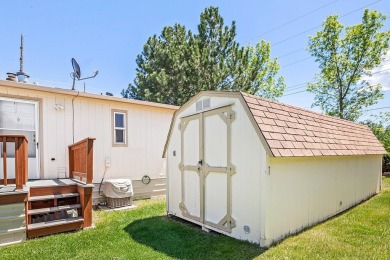 This well-maintained 4-bedroom, 2-bath double wide offers on Bill Roberts Municipal Golf Course in Montana - for sale on GolfHomes.com, golf home, golf lot