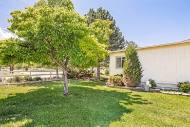This well-maintained 4-bedroom, 2-bath double wide offers on Bill Roberts Municipal Golf Course in Montana - for sale on GolfHomes.com, golf home, golf lot