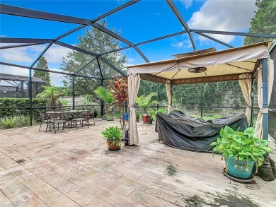 Under contract-accepting backup offers. FURNITURE, TV's  OUTSIDE on Ridgewood Lakes Golf and Country Club in Florida - for sale on GolfHomes.com, golf home, golf lot