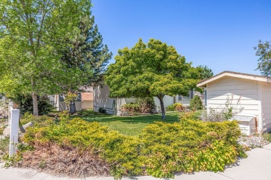 This well-maintained 4-bedroom, 2-bath double wide offers on Bill Roberts Municipal Golf Course in Montana - for sale on GolfHomes.com, golf home, golf lot