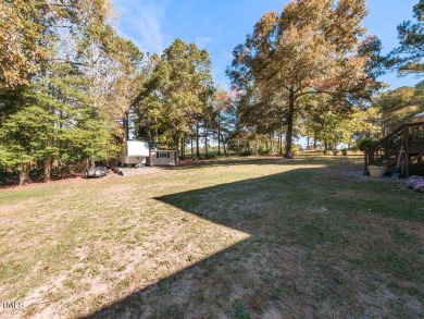 Welcome to this beautifully appointed 3-bedroom, 2.5-bath home on Reedy Creek Golf Course in North Carolina - for sale on GolfHomes.com, golf home, golf lot