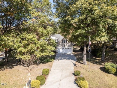 Welcome to this beautifully appointed 3-bedroom, 2.5-bath home on Reedy Creek Golf Course in North Carolina - for sale on GolfHomes.com, golf home, golf lot