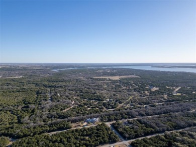 Nestled within the exclusive gated community of White Bluff on White Bluff Resort - New Course in Texas - for sale on GolfHomes.com, golf home, golf lot