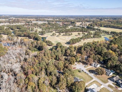 Welcome to this beautifully appointed 3-bedroom, 2.5-bath home on Reedy Creek Golf Course in North Carolina - for sale on GolfHomes.com, golf home, golf lot