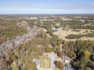 Welcome to this beautifully appointed 3-bedroom, 2.5-bath home on Reedy Creek Golf Course in North Carolina - for sale on GolfHomes.com, golf home, golf lot