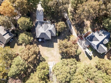 Welcome to this beautifully appointed 3-bedroom, 2.5-bath home on Reedy Creek Golf Course in North Carolina - for sale on GolfHomes.com, golf home, golf lot