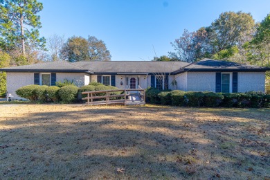 This 3-bedroom, 2-bathroom brick house is situated on over half on Sweetwater Country Club in South Carolina - for sale on GolfHomes.com, golf home, golf lot