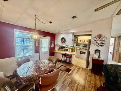 Home is located in Water Oak Country Club Estates in Lady Lake on Water Oak Country Club Estates in Florida - for sale on GolfHomes.com, golf home, golf lot