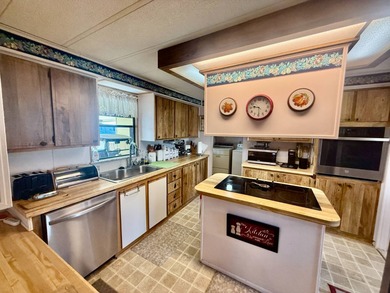 Home is located in Water Oak Country Club Estates in Lady Lake on Water Oak Country Club Estates in Florida - for sale on GolfHomes.com, golf home, golf lot