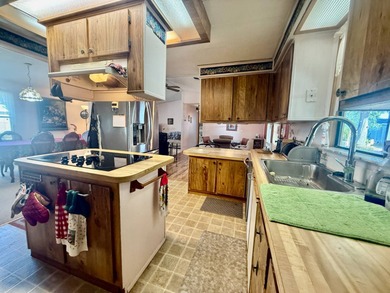 Home is located in Water Oak Country Club Estates in Lady Lake on Water Oak Country Club Estates in Florida - for sale on GolfHomes.com, golf home, golf lot