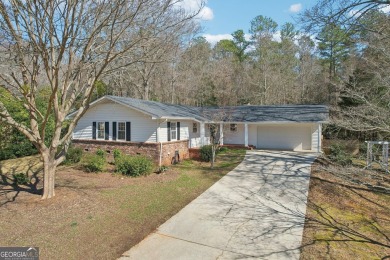 LOCATION! Welcome to your oh-so-charming, newly renovated, ONE on Indian Creek Golf Club in Georgia - for sale on GolfHomes.com, golf home, golf lot