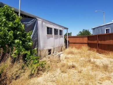 Victorville, Ca.  16782 Pebble Beach Court.  Manufactured home on Green Tree Golf Course in California - for sale on GolfHomes.com, golf home, golf lot