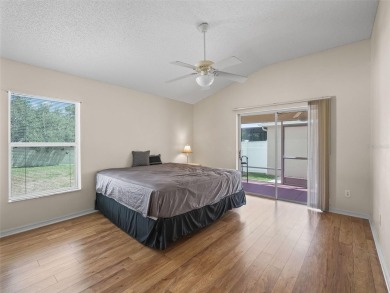 Welcome to a RARE courtyard villa with an OVERSIZED LOT in the on The Links of Spruce Creek in Florida - for sale on GolfHomes.com, golf home, golf lot