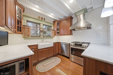 STRAIGHT OUT OF A MAGAZINE is this Charming Original Crane on Lake Mohawk Golf Club in New Jersey - for sale on GolfHomes.com, golf home, golf lot