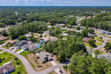 Build your dream home on this beautiful vacant lot in the on The Grand Club - Pine Lakes Course in Florida - for sale on GolfHomes.com, golf home, golf lot
