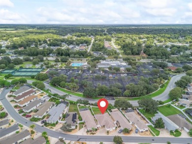 Welcome to a RARE courtyard villa with an OVERSIZED LOT in the on The Links of Spruce Creek in Florida - for sale on GolfHomes.com, golf home, golf lot