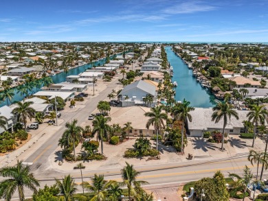 Paradise awaits! Welcome to your 3 bedroom 2 bath dream home in on Key Colony Beach Golf Course in Florida - for sale on GolfHomes.com, golf home, golf lot