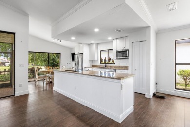 Located in the prestigious Boca Woods Country Club, this updated on Boca Woods Country Club in Florida - for sale on GolfHomes.com, golf home, golf lot