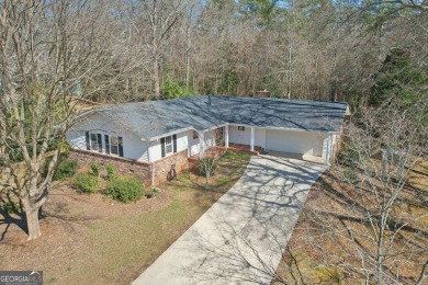 LOCATION! Welcome to your oh-so-charming, newly renovated, ONE on Indian Creek Golf Club in Georgia - for sale on GolfHomes.com, golf home, golf lot