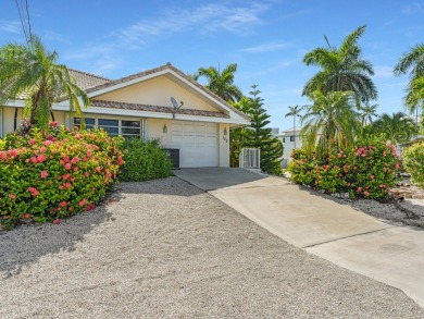 Paradise awaits! Welcome to your 3 bedroom 2 bath dream home in on Key Colony Beach Golf Course in Florida - for sale on GolfHomes.com, golf home, golf lot