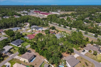 Build your dream home on this beautiful vacant lot in the on The Grand Club - Pine Lakes Course in Florida - for sale on GolfHomes.com, golf home, golf lot