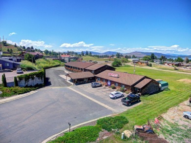 Remarks: Flathead Lake Inn is within walking distance to Polson on Polson Bay Golf Course - Championship Course in Montana - for sale on GolfHomes.com, golf home, golf lot