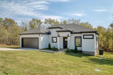 Discover Your Dream Home in Desirable Tahitian Village!This on Pine Forest Golf Club in Texas - for sale on GolfHomes.com, golf home, golf lot