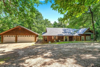 Secluded 3 bedroom 2 bath home surrounded on all 4 sides by on Holly Lake Ranch Golf Club in Texas - for sale on GolfHomes.com, golf home, golf lot