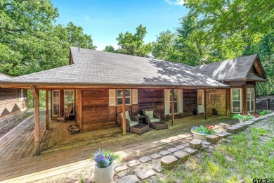 Secluded 3 bedroom 2 bath home surrounded on all 4 sides by on Holly Lake Ranch Golf Club in Texas - for sale on GolfHomes.com, golf home, golf lot