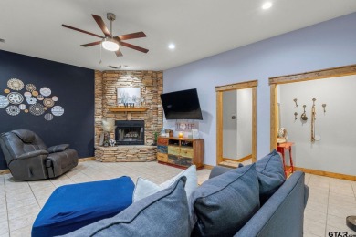Secluded 3 bedroom 2 bath home surrounded on all 4 sides by on Holly Lake Ranch Golf Club in Texas - for sale on GolfHomes.com, golf home, golf lot