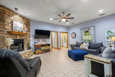 Secluded 3 bedroom 2 bath home surrounded on all 4 sides by on Holly Lake Ranch Golf Club in Texas - for sale on GolfHomes.com, golf home, golf lot