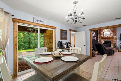 Secluded 3 bedroom 2 bath home surrounded on all 4 sides by on Holly Lake Ranch Golf Club in Texas - for sale on GolfHomes.com, golf home, golf lot