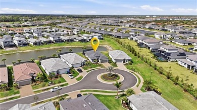 Located on a private cul-de-sac with water view in the highly on Valencia Golf and Country Club in Florida - for sale on GolfHomes.com, golf home, golf lot