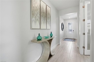 Located on a private cul-de-sac with water view in the highly on Valencia Golf and Country Club in Florida - for sale on GolfHomes.com, golf home, golf lot