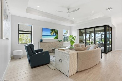 Located on a private cul-de-sac with water view in the highly on Valencia Golf and Country Club in Florida - for sale on GolfHomes.com, golf home, golf lot