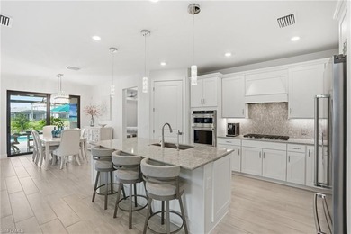 Located on a private cul-de-sac with water view in the highly on Valencia Golf and Country Club in Florida - for sale on GolfHomes.com, golf home, golf lot