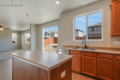 This impressive 3,350 sq. ft. two-story home in Meridian Ranch on Antler Creek Golf Course in Colorado - for sale on GolfHomes.com, golf home, golf lot