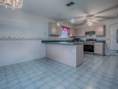 LOCATION! LOCATION! LOCATION! This spacious 3/2 CYPRESS model on Hacienda Hills Golf and Country Club in Florida - for sale on GolfHomes.com, golf home, golf lot